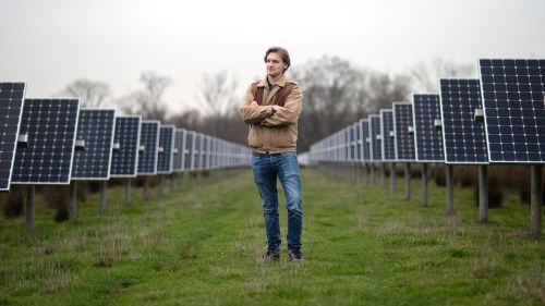 Wilson Ricks, first author of the study, at the solar array at Princeton University. Photo by Bumper DeJesus