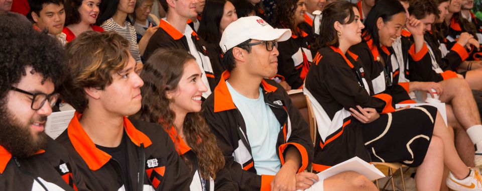 Students sitting inside during class day celebration