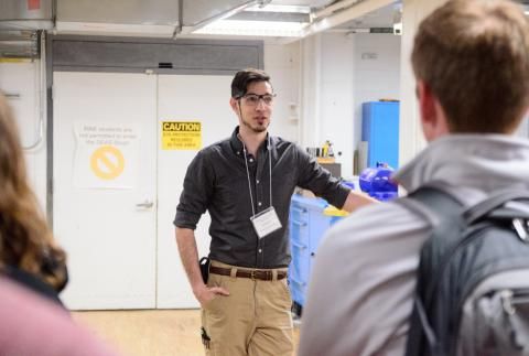 Al Gaillard talking with students in lab