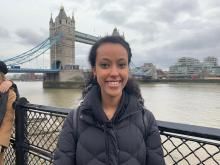 Beimnet Shitaye smiling with water and bridge in background