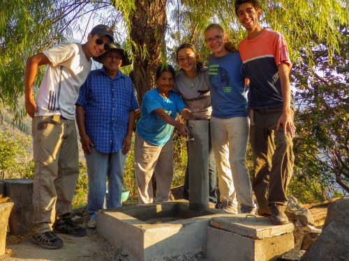 Opening a faucet in Peru.