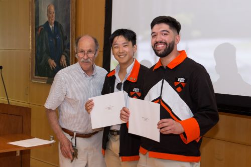 Professor Michael Littman with two award winners at the MAE class day celebration