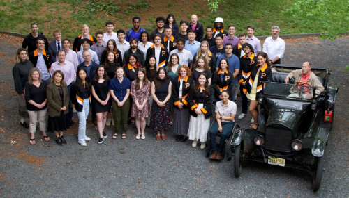 MAE seniors and staff posing together.