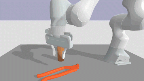 A robotic arm picking up a tool
