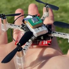 a drone sitting on a hand